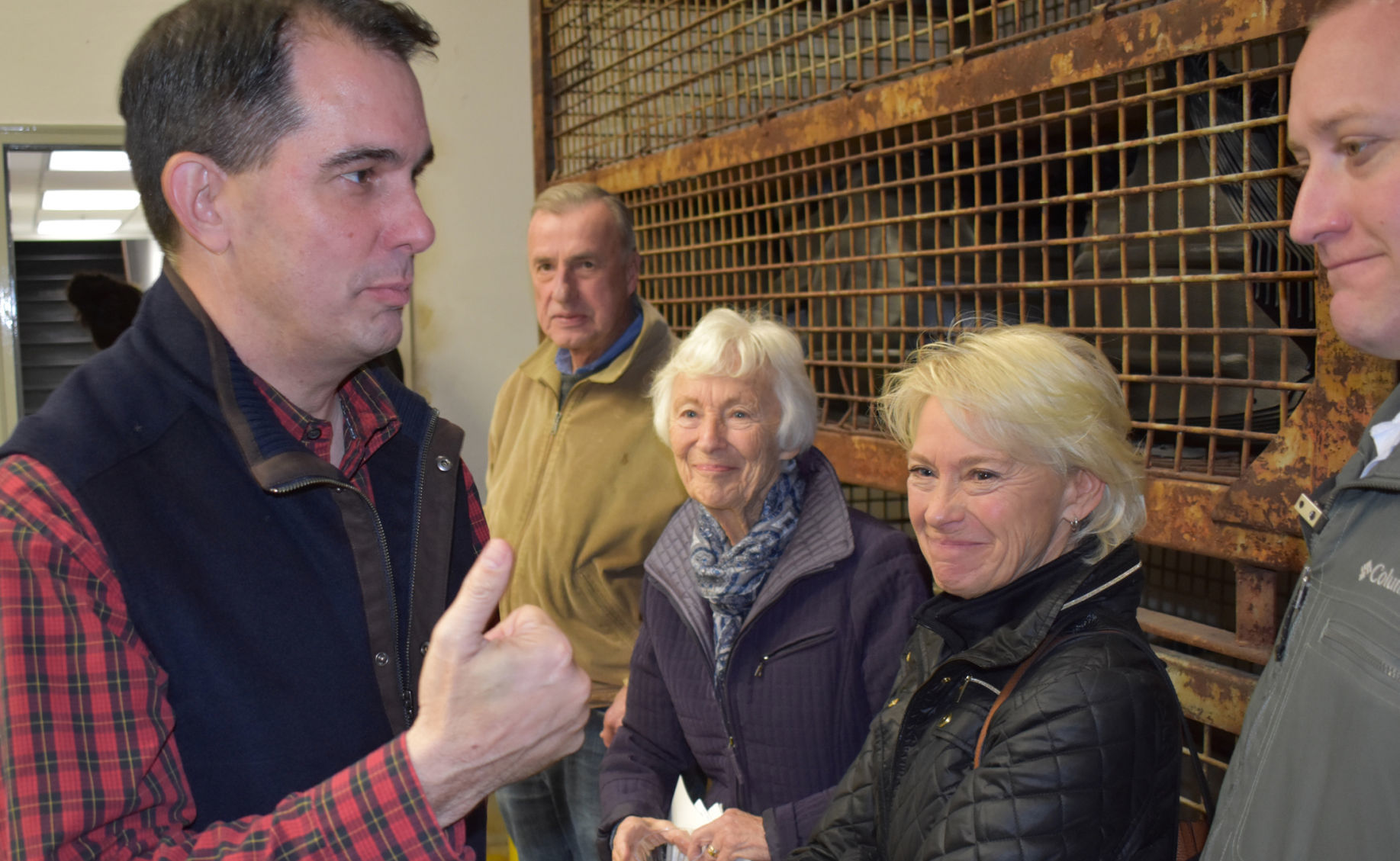 Walker greets supporters